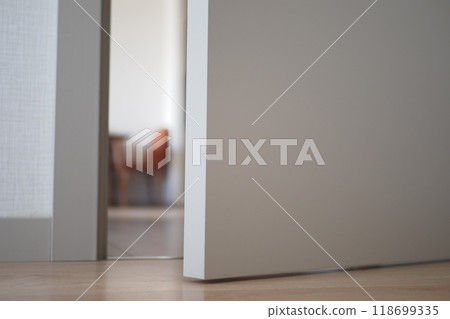 open door concept with Door handle and blur interior room background, 118699335