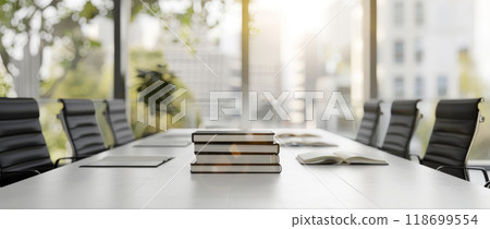 A table with a stack of books and a potted plant in front of a window by AI generated image 118699554