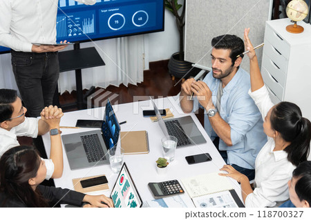 Office worker raise hand up asking for question during business meeting. Prudent 118700327