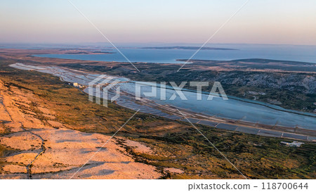 Amazing view of salt pans for salt production in the Adriatic Sea in the twilight.  118700644