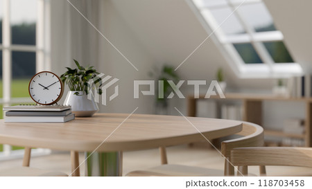 A minimalist wooden table featuring copy space for displaying products, set in a minimalist home. 118703458
