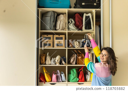 There are many fashionable, trendy, bright and colorful bags in your home wardrobe.  118703882