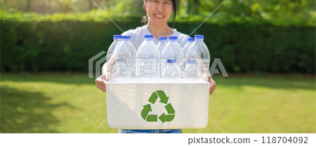 Plastic bottle for separating recycle materials from the garbages. Recycling in environmental sustainability and reducing carbon emissions, protect the environment, reducing waste, recycling materials Plastic bottle for separating recycle materials from the garbages. Recycling in environmental sustainability and reducing carbon emissions, protect the environment, reducing waste, recycling materials 118704092