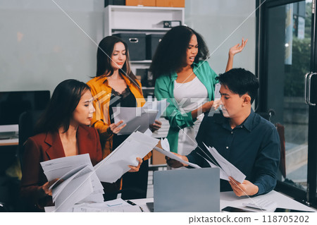 Stress, business people and employee frustrated with multitasking, pressure or overworked by team in chaos with paperwork. Anxiety, headache and worker overwhelmed by group and burnout in crisis Stress, business people and employee frustrated with multitasking, pressure or overworked by team in chaos with paperwork. Anxiety, headache and worker overwhelmed by group and burnout in crisis 118705202