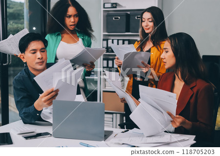 Stress, business people and employee frustrated with multitasking, pressure or overworked by team in chaos with paperwork. Anxiety, headache and worker overwhelmed by group and burnout in crisis Stress, business people and employee frustrated with multitasking, pressure or overworked by team in chaos with paperwork. Anxiety, headache and worker overwhelmed by group and burnout in crisis 118705203