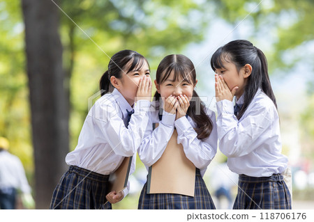 A girl happily talking A girl happily talking 118706176