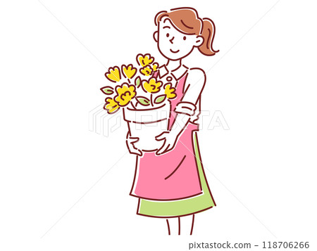 A young female staff member at a flower shop holding a flower pot with flowers in it 118706266