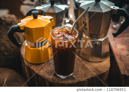 Iced coffee in a glass placed on a wooden table 118706951
