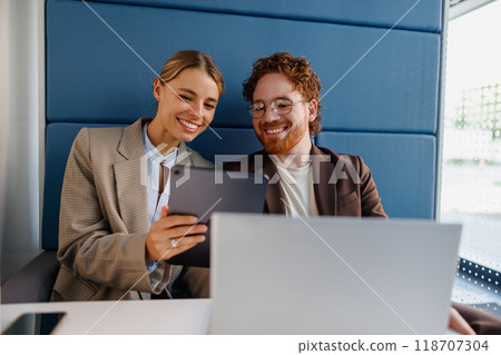 A group of collaborative professionals engaging effectively with modern technology tools 118707304