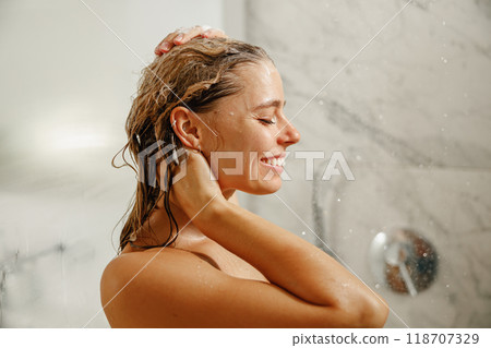 Indulging in a Refreshing Shower Moment that Leaves Your Skin Radiantly Gleaming and Smooth Indulging in a Refreshing Shower Moment that Leaves Your Skin Radiantly Gleaming and Smooth 118707329