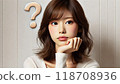 Woman with a question mark 118708936