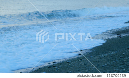 Gorgeous Waterside Bank. Sea Water Waves Are Crashing On The Pebble Beach At Sunrise. Real time. 118709289
