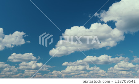 Cumulus Cloudscape. Beautiful Movement Of Puffy Fluffy White Clouds Fly Across Clear Blue Sky. Cumulus Cloudscape. Beautiful Movement Of Puffy Fluffy White Clouds Fly Across Clear Blue Sky. 118709541