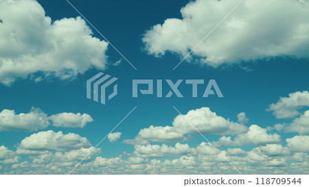 Tiny Fluffy Clouds In Sunny Day. Puffy Fluffy White Clouds. Cumulus Cloud Cloudscape. Atmosphere. 118709544