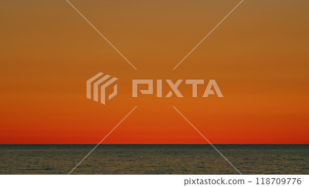 Concept - Vacation And Relax. Sea Surface At Sunset. Summer Landscape. Orange Sea At Sunset. Slow motion. 118709776