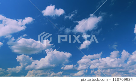 Clear Blue Sky With Peaceful Pink Clouds And Blue Sky. Natural Abstraction. Hope And Peace. Dreamy Sky. Clear Blue Sky With Peaceful Pink Clouds And Blue Sky. Natural Abstraction. Hope And Peace. Dreamy Sky. 118709924