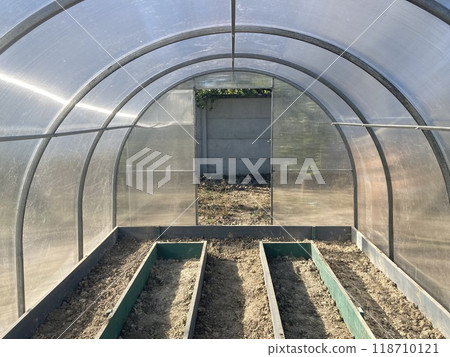 Installing wooden beds in a greenhouse Installing wooden beds in a greenhouse 118710121