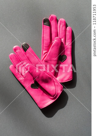 Pink gloves with black hearts on the palm and an insert on the fingers Pink gloves with black hearts on the palm and an insert on the fingers 118711953