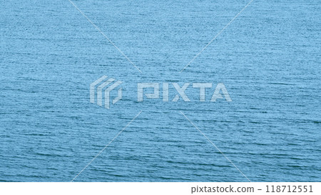 Continuously Changing Turquoise Sea Or Ocean Surface Water. Water Moving On Ocean Surface. Still. Continuously Changing Turquoise Sea Or Ocean Surface Water. Water Moving On Ocean Surface. Still. 118712551
