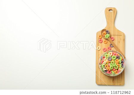 Colorful cornflakes, concept of tasty breakfast, morning food, space for text 118712962