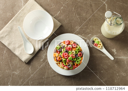 Colorful cornflakes, concept of tasty breakfast, morning food Colorful cornflakes, concept of tasty breakfast, morning food 118712964