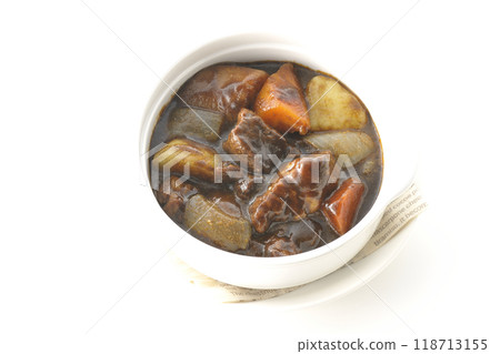 Beef stew with chunky vegetables photographed on white background 118713155