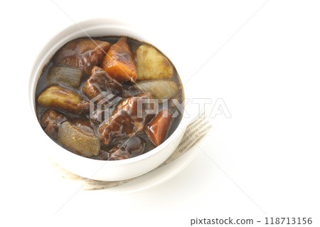 Beef stew with chunky vegetables photographed on white background Beef stew with chunky vegetables photographed on white background 118713156