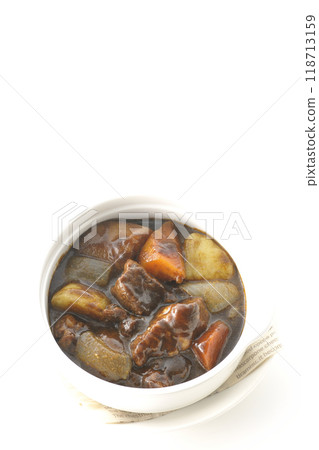 Beef stew with chunky vegetables photographed on white background Beef stew with chunky vegetables photographed on white background 118713159
