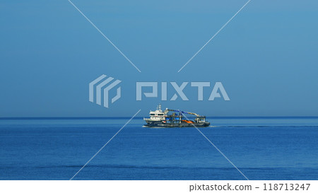 Fishing Vessel Goes To Sea To Catch Fish. Ship Floats On Sea Surface Leaving Path Of Sea Foam Water. Still. 118713247