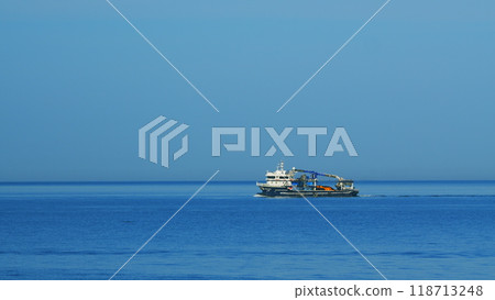 Fishing Ship In The Calm Sea. Fishing Boat Out In The Ocean Or Sea Wide. Still. 118713248
