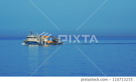 Seafood Production In The Sea Or Ocean. Fishing Boat Sails In The Open Sea. Still. Seafood Production In The Sea Or Ocean. Fishing Boat Sails In The Open Sea. Still. 118713255