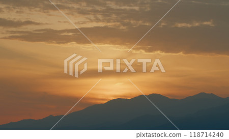 Landscape Colorful Sky At Sunrise. Nature Mountain Sky And Clouds Sunrise Concept. Real time. 118714240