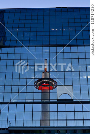 Kyoto Tower reflected in the window of Kyoto Station Building 118714250
