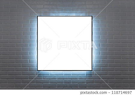 frame hanging on a brick wall illuminated wit LED light 118714697