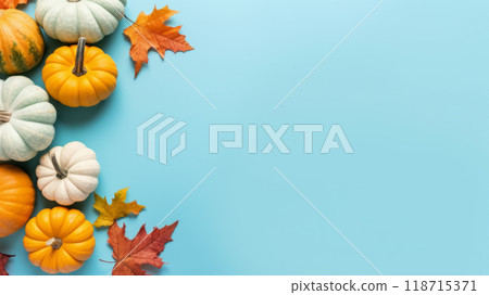 Colorful Pumpkins and Autumn Leaves on Light Blue Background banner 118715371
