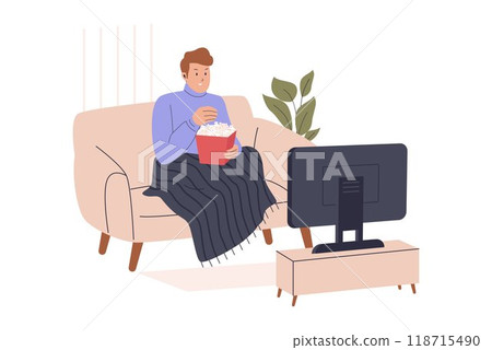 Man relaxing watching a movie on the sofa 118715490