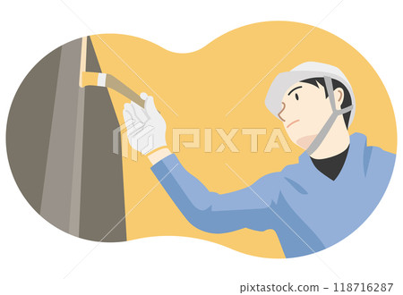 Male worker painting with a brush Male worker painting with a brush 118716287