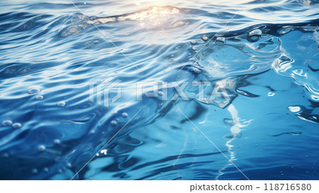 background of water with ripples and light reflected in it background of water with ripples and light reflected in it 118716580