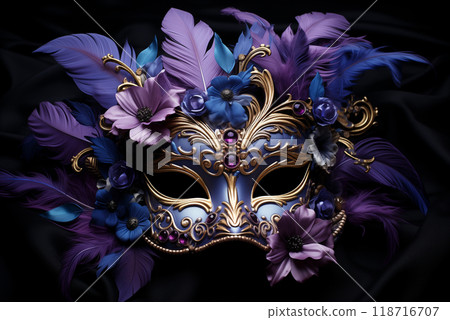 A purple mardi gras venitian mask with feathers and flowers on a black background 118716707