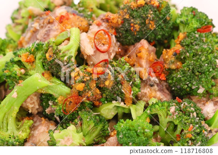 Broccoli and mackerel aglio e olio on a light background Broccoli and mackerel aglio e olio on a light background 118716808