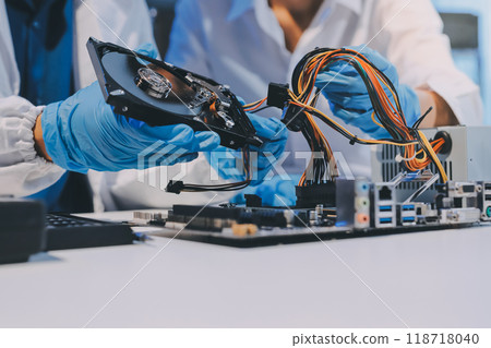 Electronics technician, electronic engineering electronic repair, electronics measuring and testing, repair and maintenance concepts. Electronics technician, electronic engineering electronic repair, electronics measuring and testing, repair and maintenance concepts. 118718040