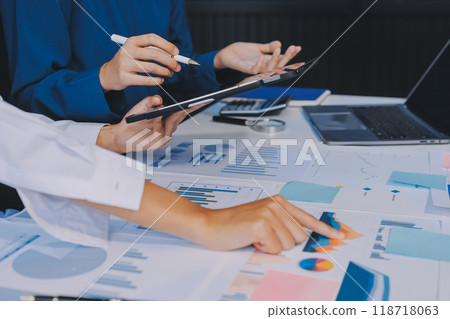 Fund managers team consultation and discuss about analysis Investment stock market at office 118718063