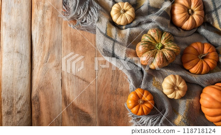 Many different colorful pumpkins on wooden background. Top view. Halloween and harvest concept. 118718124