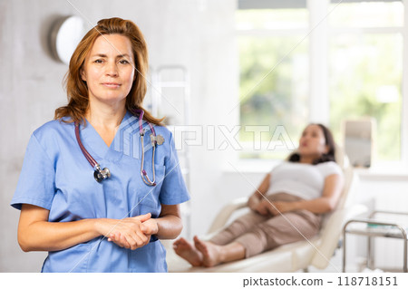 Portrait of middle-aged doctor 118718151