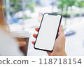 Hand holding smartphone mockup of blank screen, Take your screen to put on advertising. 118718154