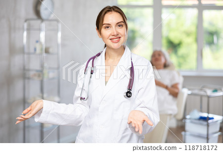 Young doctor with stethoscope Young doctor with stethoscope 118718172
