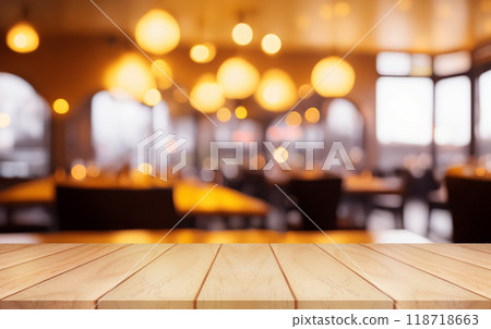 Empty wooden table top with lights bokeh on blur restaurant background Empty wooden table top with lights bokeh on blur restaurant background 118718663