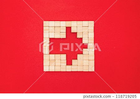 紅色背景上以右向箭頭形狀排列的方形柏木塊的三維圖示的前視圖 紅色背景上以右向箭頭形狀排列的方形柏木塊的三維圖示的前視圖 118719205