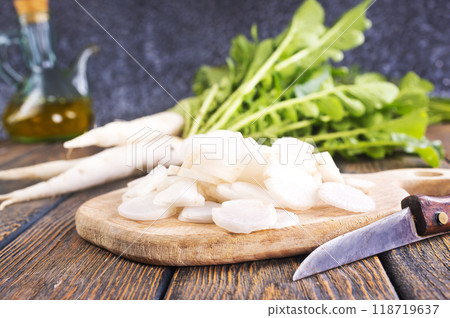 White radish on wooden board White radish on wooden board 118719637