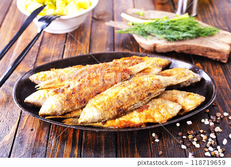 Fried fish in flour and oil 118719659